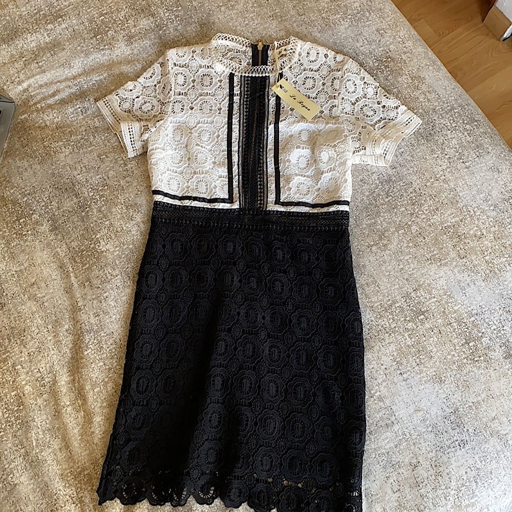 Brand new boutique lace black and white dress